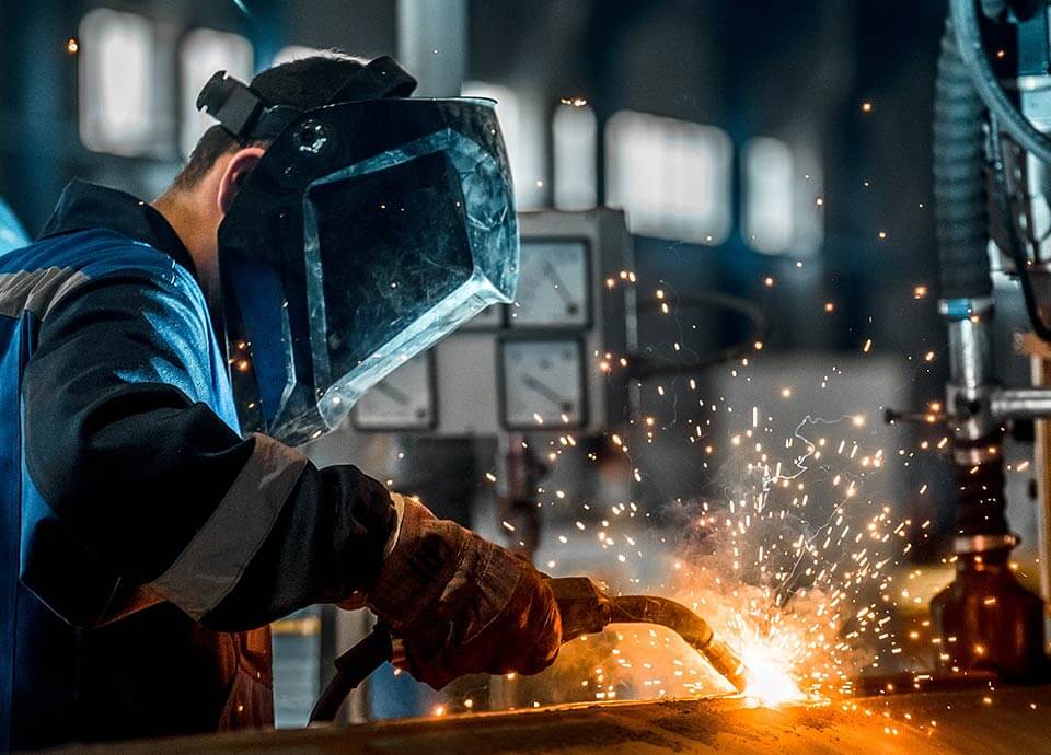 Worker Welding and Fabricating